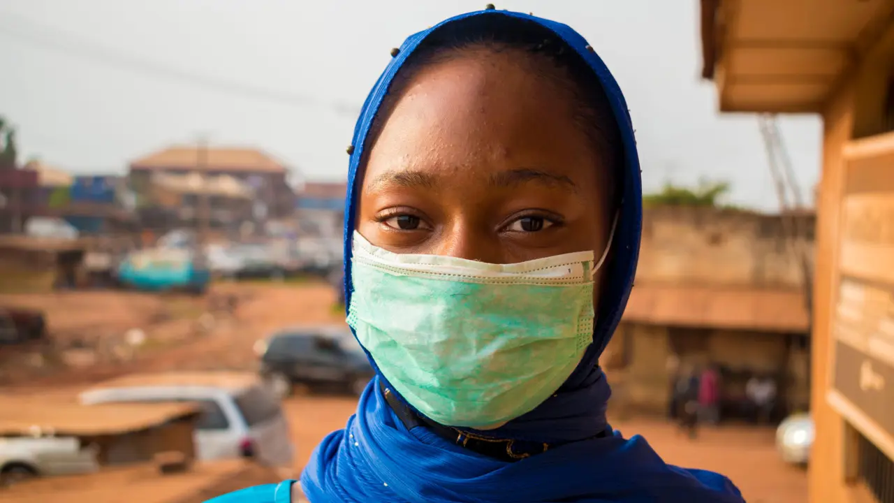 A woman wearing a face mask