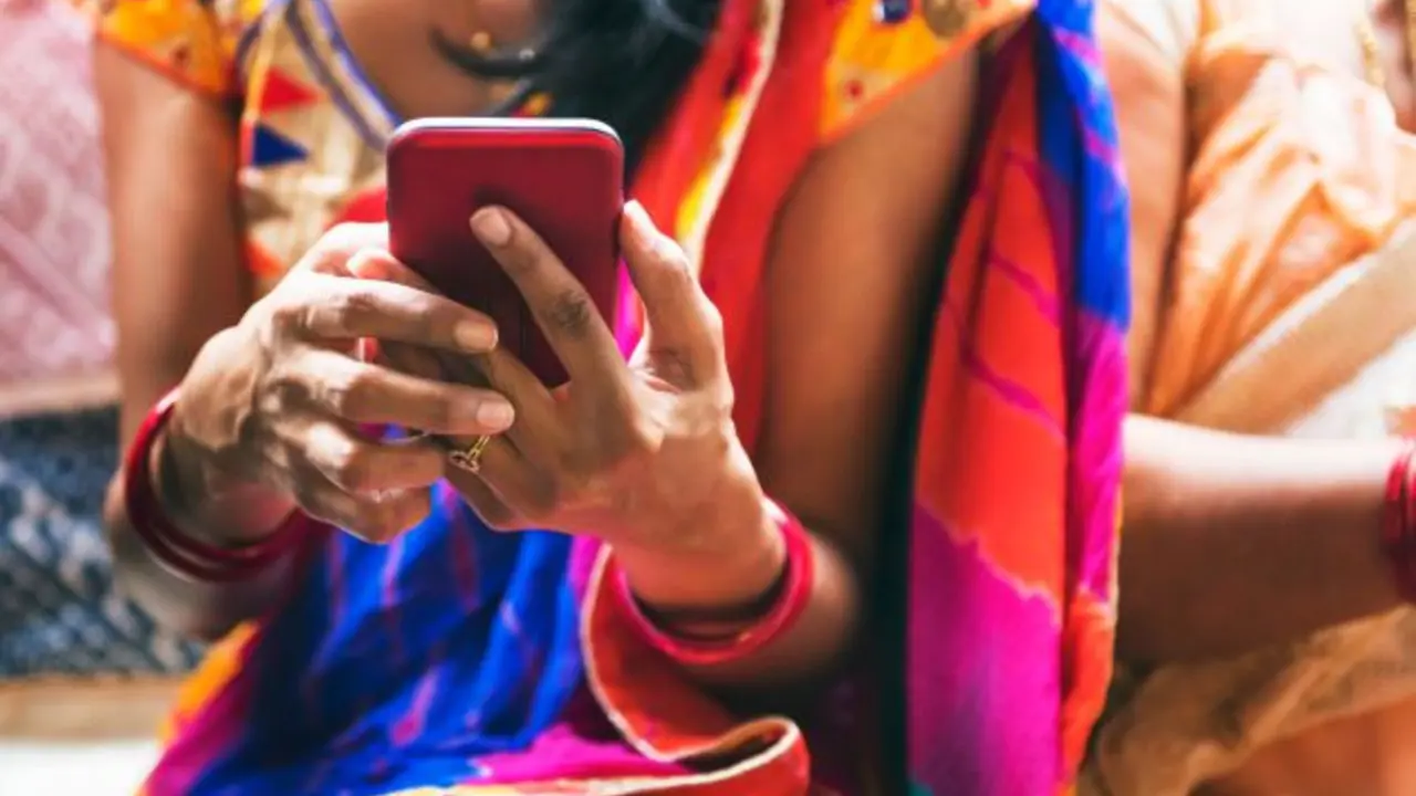 A woman's hands holding a smartphone