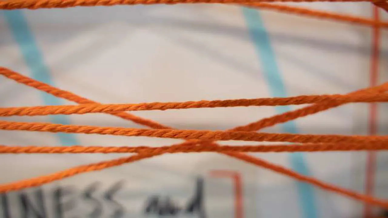 close up of orange wool thread