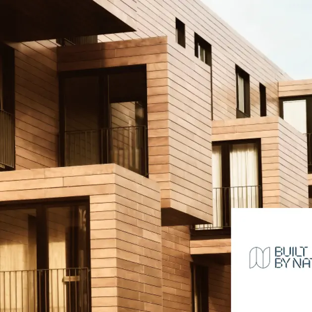 Built By Nature logo and wood apartments