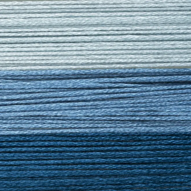 close up of blue wool thread