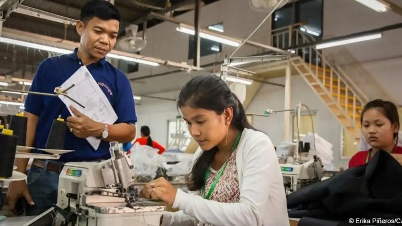 Workers at a research facility using high tech equipment