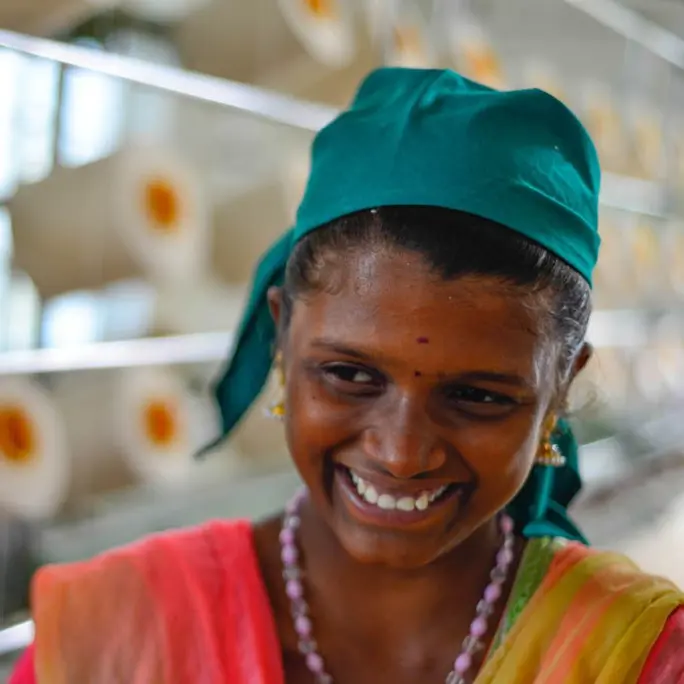 Smiling Woman In Clothing Factory 1
