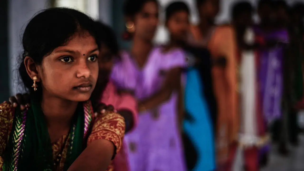 A young girl looking into the distance